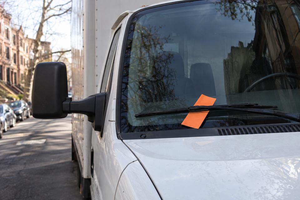 NYC parking ticket on a truck windshield